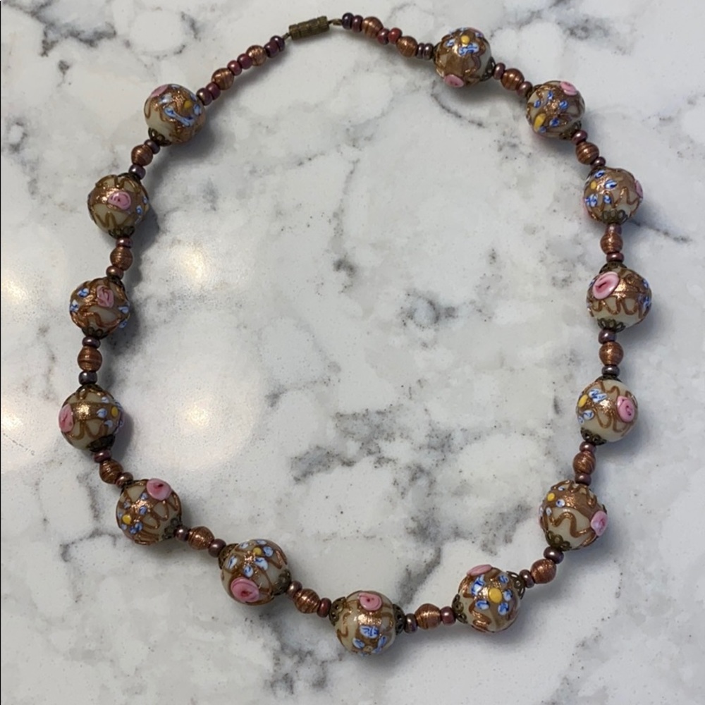 Gold pink and blue beaded necklace
